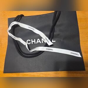 CHANEL Black Bag with White Ribbon
